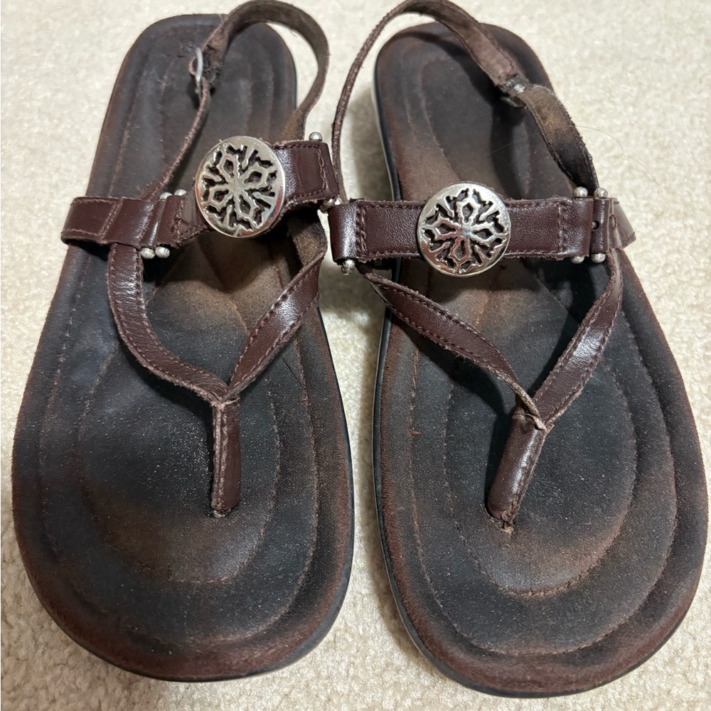 Minnetonka Dark Brown Sandals with Silver Medallions